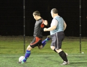 Action From a Night of Soccer Six
