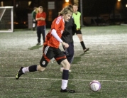 Action From a Night of Soccer Six