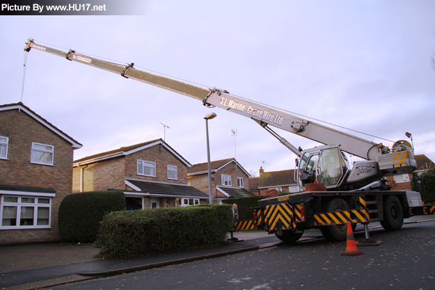 Hot Tub Lifted Over House HU17