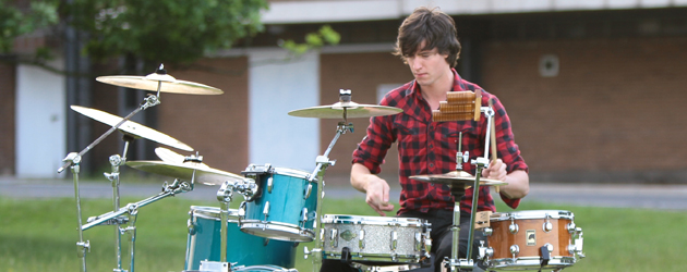 Thrash Metal Drummer Fulfills a Dream in Beverley Kris Caprani had long harboured a dream. Not your everyday dream of a huge house,...