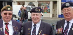I saw you had your own photographer at the Armed Forces Day, today, but I have attached a couple of photos, I thought you may like to use. Aforesaid photographer was dedicated to his cause when he climbed the roc