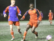 Action From a Night of Soccer Six