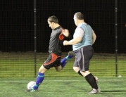 Action From a Night of Soccer Six