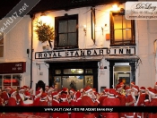 Royal Standard Invaded By Seventy Santa's