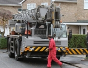 Hot Tub Lifted Over House