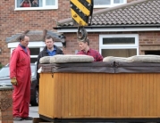 Hot Tub Lifted Over House