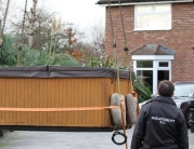 Hot Tub Lifted Over House