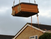 Hot Tub Lifted Over House