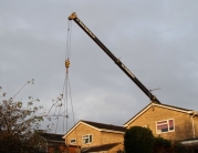 Hot Tub Lifted Over House