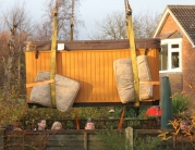 Hot Tub Lifted Over House