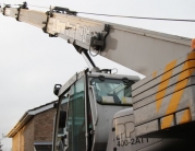 Hot Tub Lifted Over House