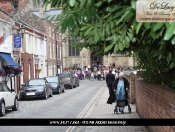 Paralympic Flame Is Welcomed By Hundreds At Beverley Minster