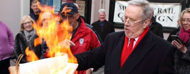 Protesters Burn Petition Outside County Hall