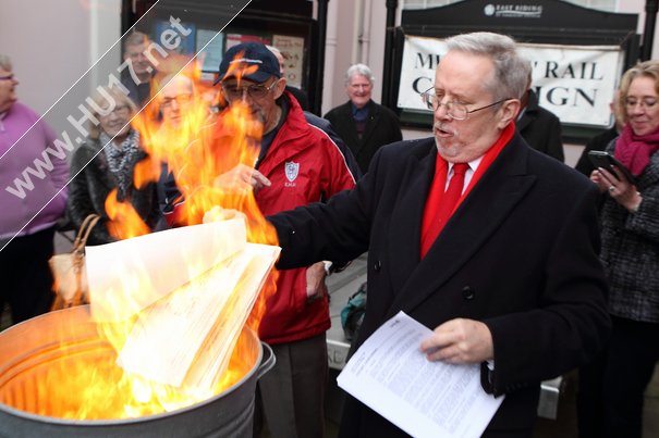 Protesters Burn Petition Outside County Hall